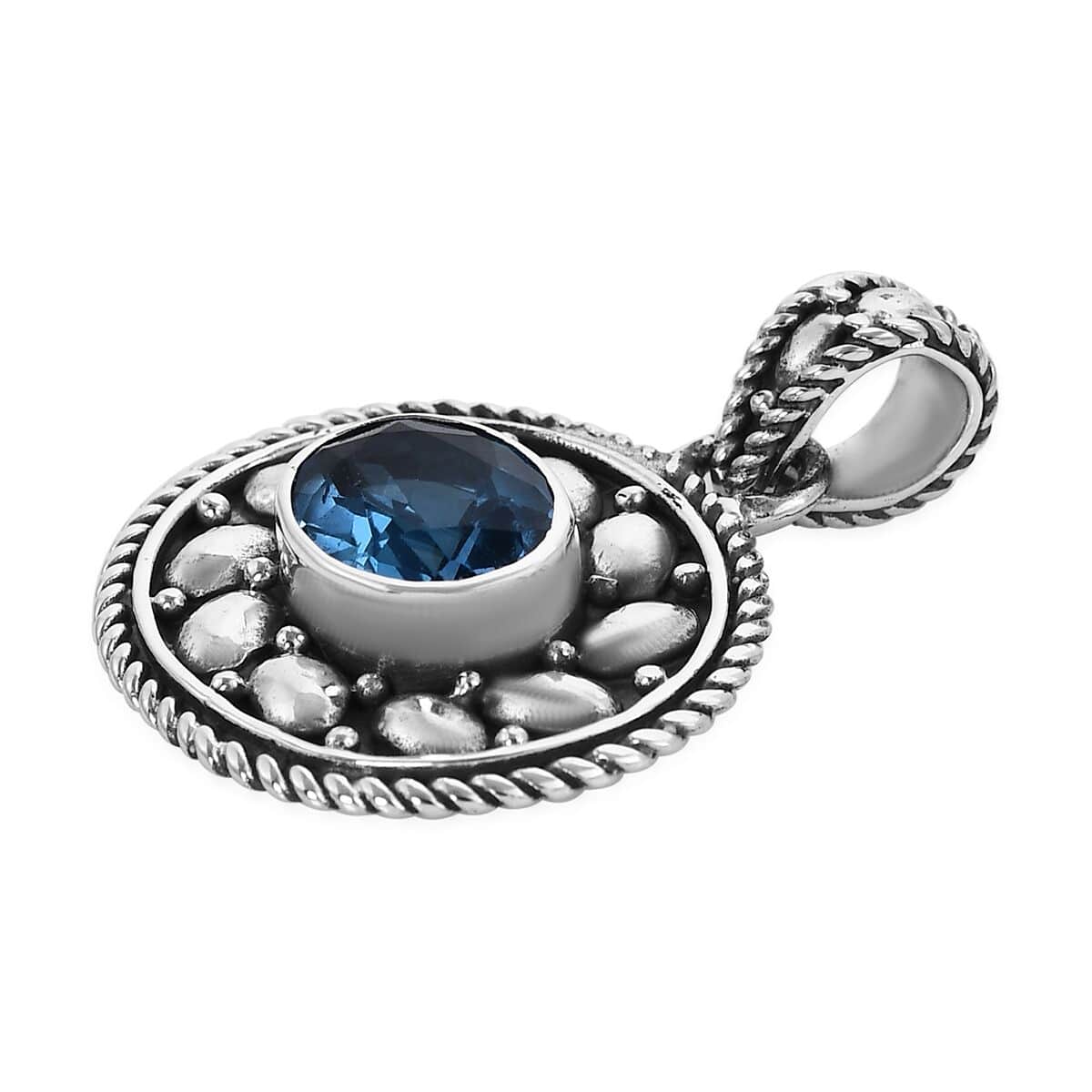 Bali Legacy Swiss Blue Topaz Floral Pendant in Sterling Silver 0.20 ctw image number 3