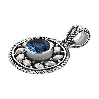 Bali Legacy Swiss Blue Topaz Floral Pendant in Sterling Silver 0.20 ctw