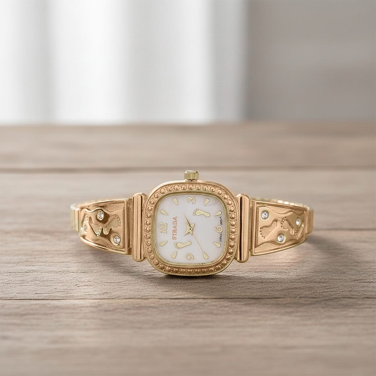 Foot Print in the Sand Strada Japanese Movement Simulated MOP Dial Watch in Goldtone and Stainless Steel image number 1