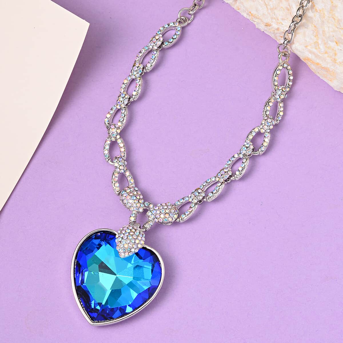 Simulated Blue Quartz and Mystic White Austrian Crystal Heart Necklace in Silvertone 20-22 Inches image number 1