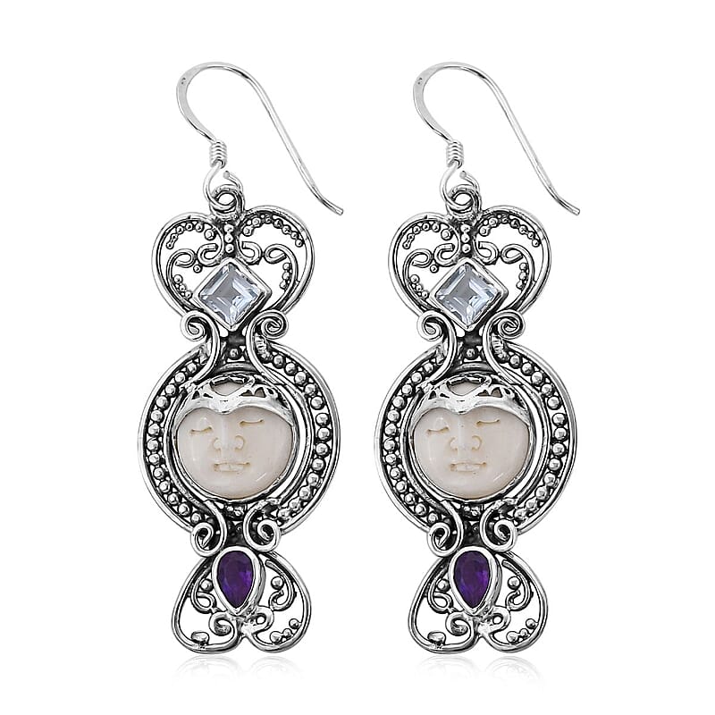 Bali Goddess Carved Bone and Sky Blue Topaz Floral Earrings in Sterling Silver 0.85 ctw