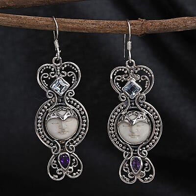 Bali Goddess Carved Bone and Sky Blue Topaz Floral Earrings in Sterling Silver 0.85 ctw