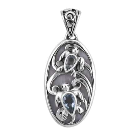 Bali Legacy Mother Of Pearl and Swiss Blue Topaz Turtles Pendant in Sterling Silver 0.70 ctw image number 0
