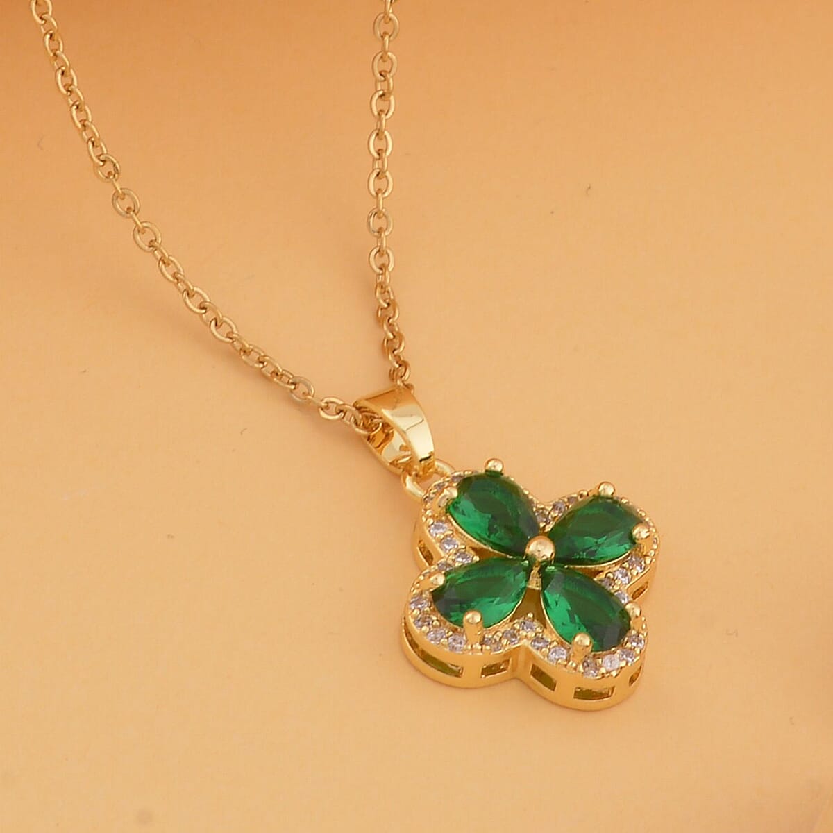 Green Glass and Simulated Diamond Four-petal Flower Necklace 20-22 Inches in Goldtone 0.10 ctw image number 1