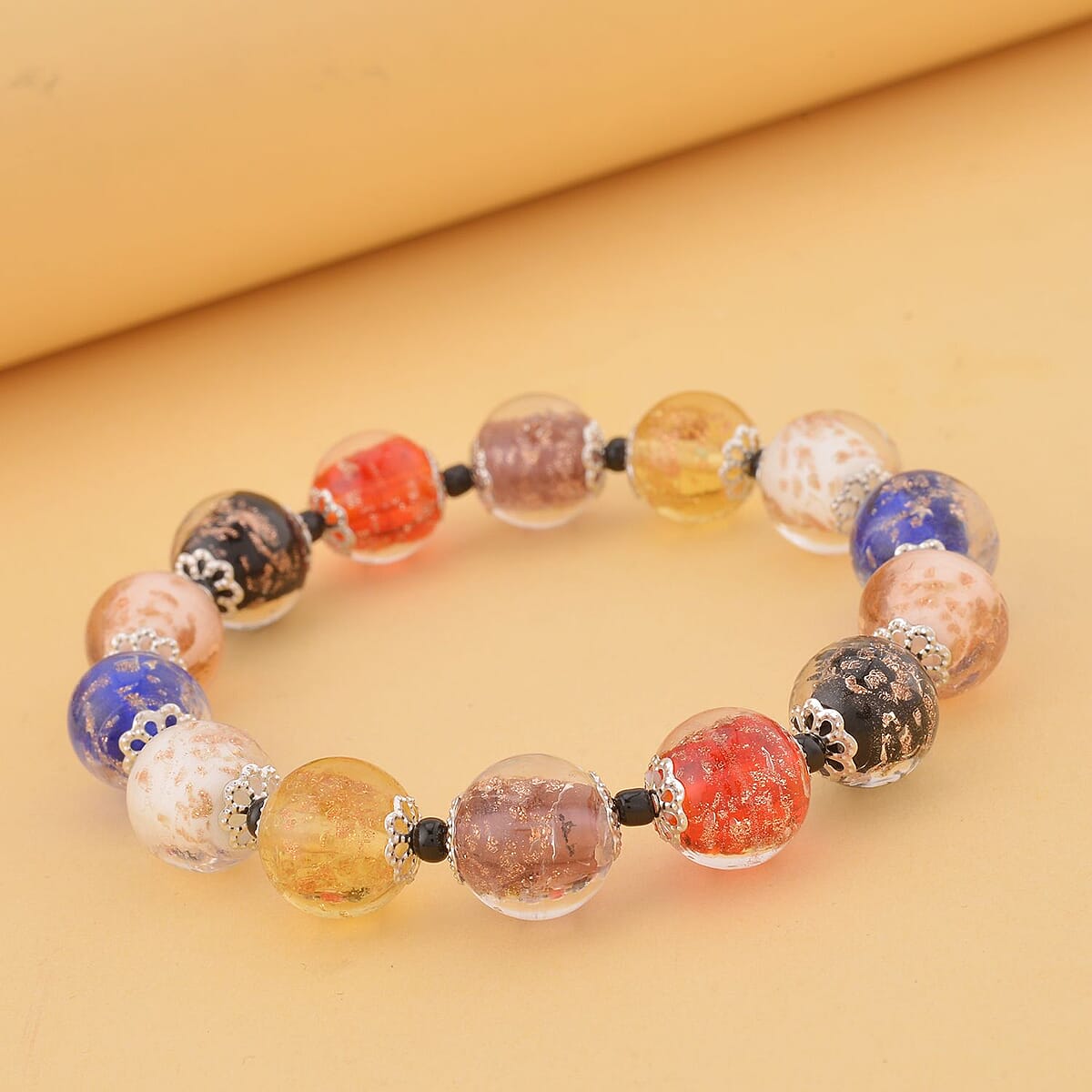 Multi Color Murano Style and Black Glass Beaded Stretch Bracelet in Silvertone image number 1