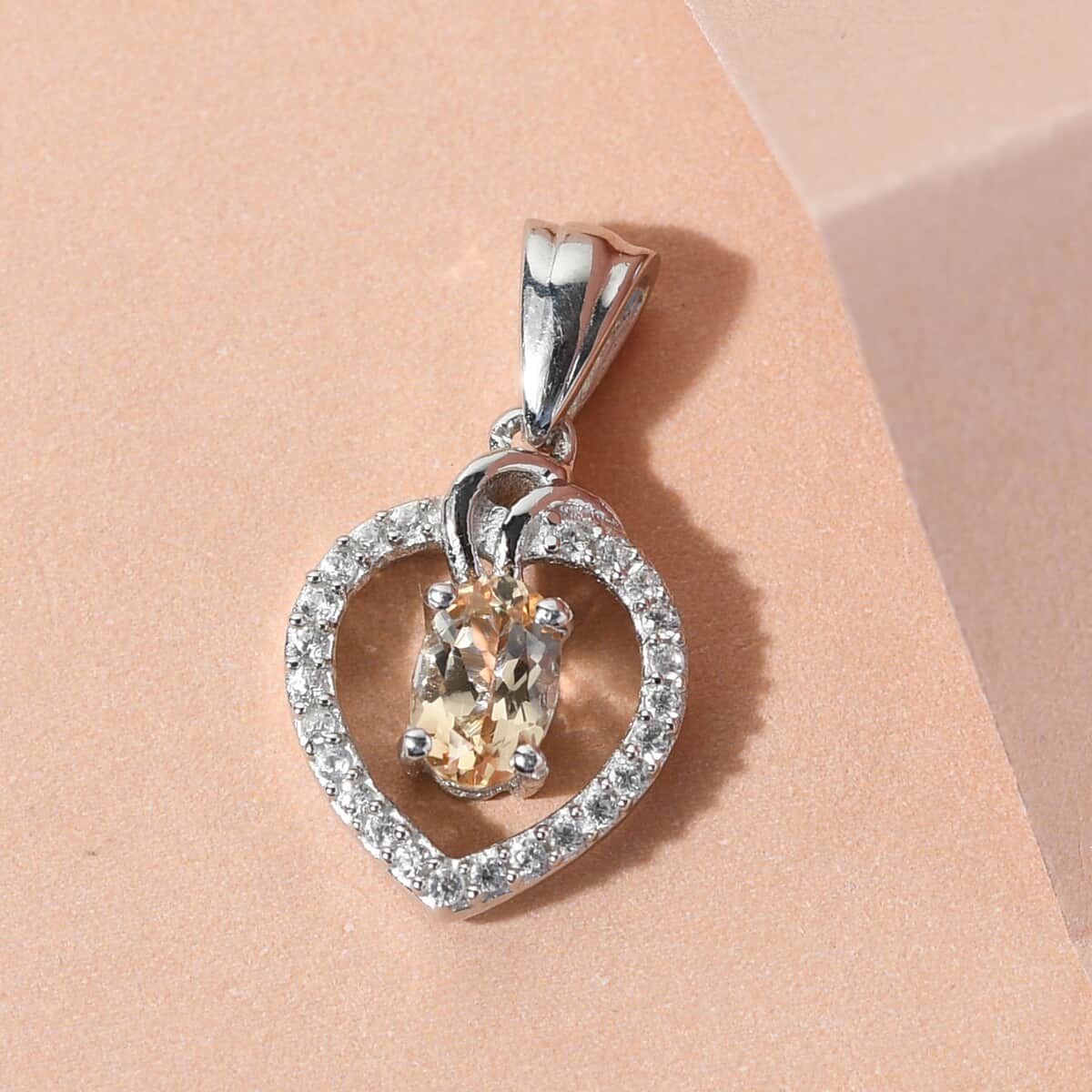 Imperial Topaz and Natural White Zircon Heart Pendant in Platinum Over Sterling Silver 0.70 ctw image number 1