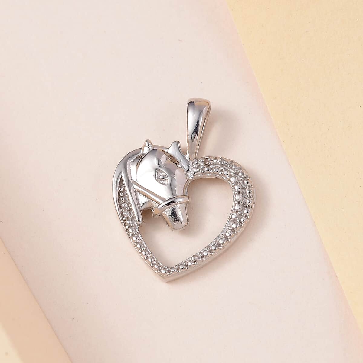 Diamond Accent Heart Pendant in Platinum Over Sterling Silver image number 1