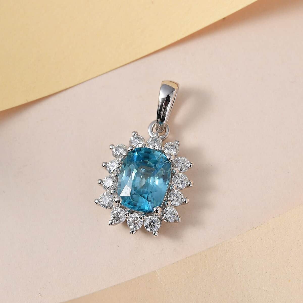 Luxoro 10K White Gold AAA Ratanakiri Blue Zircon and Moissanite Sunburst Pendant 4.25 ctw image number 1