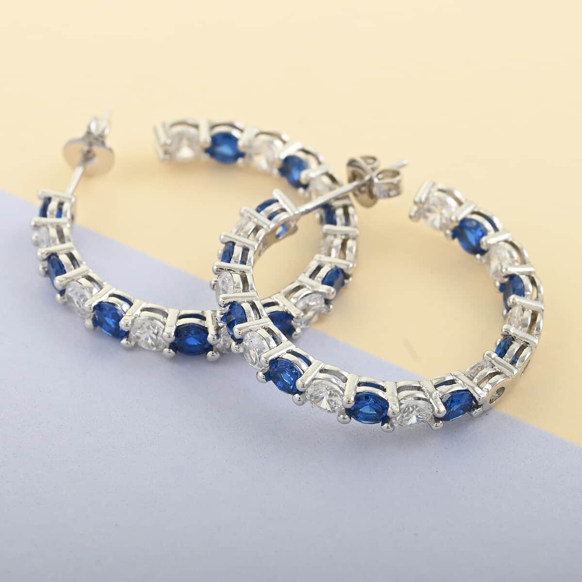 Simulated Blue and White Diamond Hoop Earrings in Silvertone 6.00 ctw image number 1