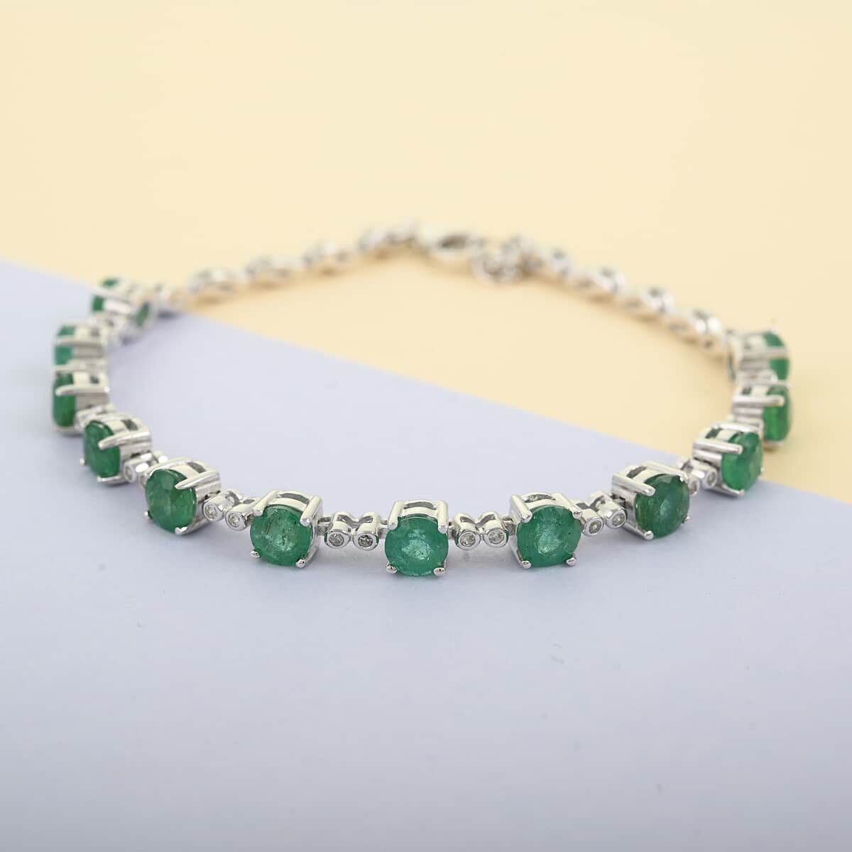 AAA Kagem Emerald and Natural White Zircon Tennis Bracelet in Rhodium Over Sterling Silver (6.50 In) 4.35 ctw image number 1
