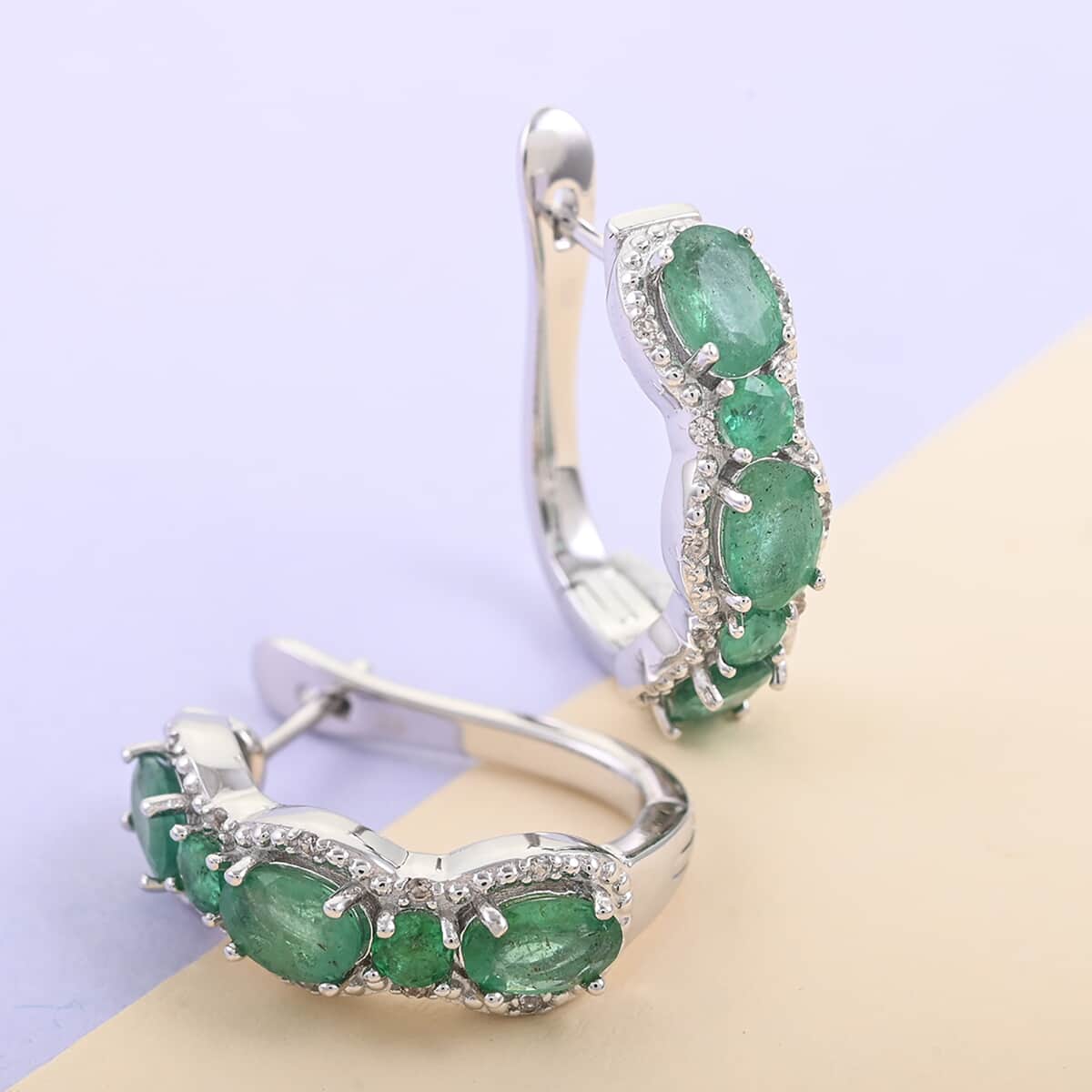 AAA Kagem Emerald and Natural White Zircon Huggie Hoop Earrings in Rhodium Over Sterling Silver 3.60 ctw image number 1