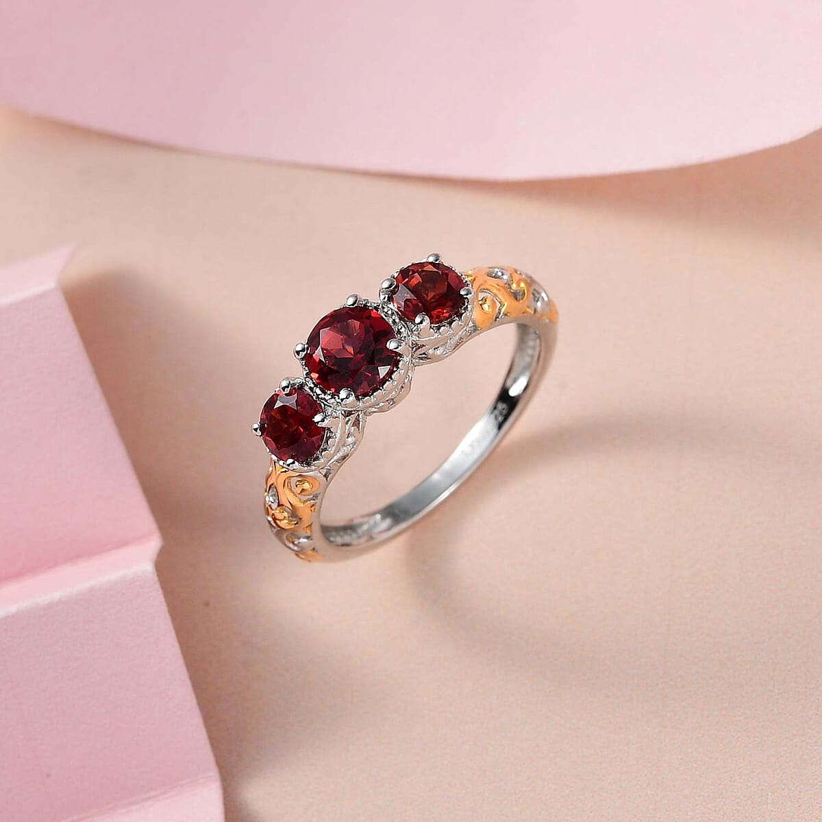 Mozambique Garnet 1.25 ctw Trilogy Ring in Vermeil Yellow Gold and Platinum Over Sterling Silver (Size 6.0)  image number 4