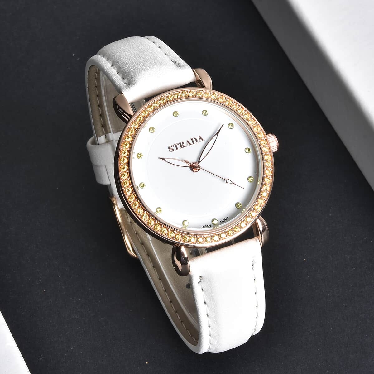 Strada Simulated Yellow Diamond Japanese Movement Watch in Rosetone with White Faux Leather Strap 0.50 ctw image number 1