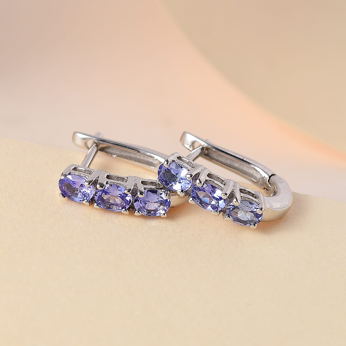 Tanzanite Earrings | Huggie Hoop Earrings | Silver Huggie Hoops | Sterling Silver Earrings | Three Stone Earrings 1.00 ctw image number 1