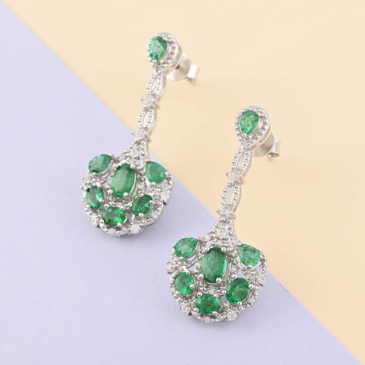 AAA Kagem Emerald and White Zircon Dangle Earrings in Rhodium Over Sterling Silver 3.25 ctw image number 1