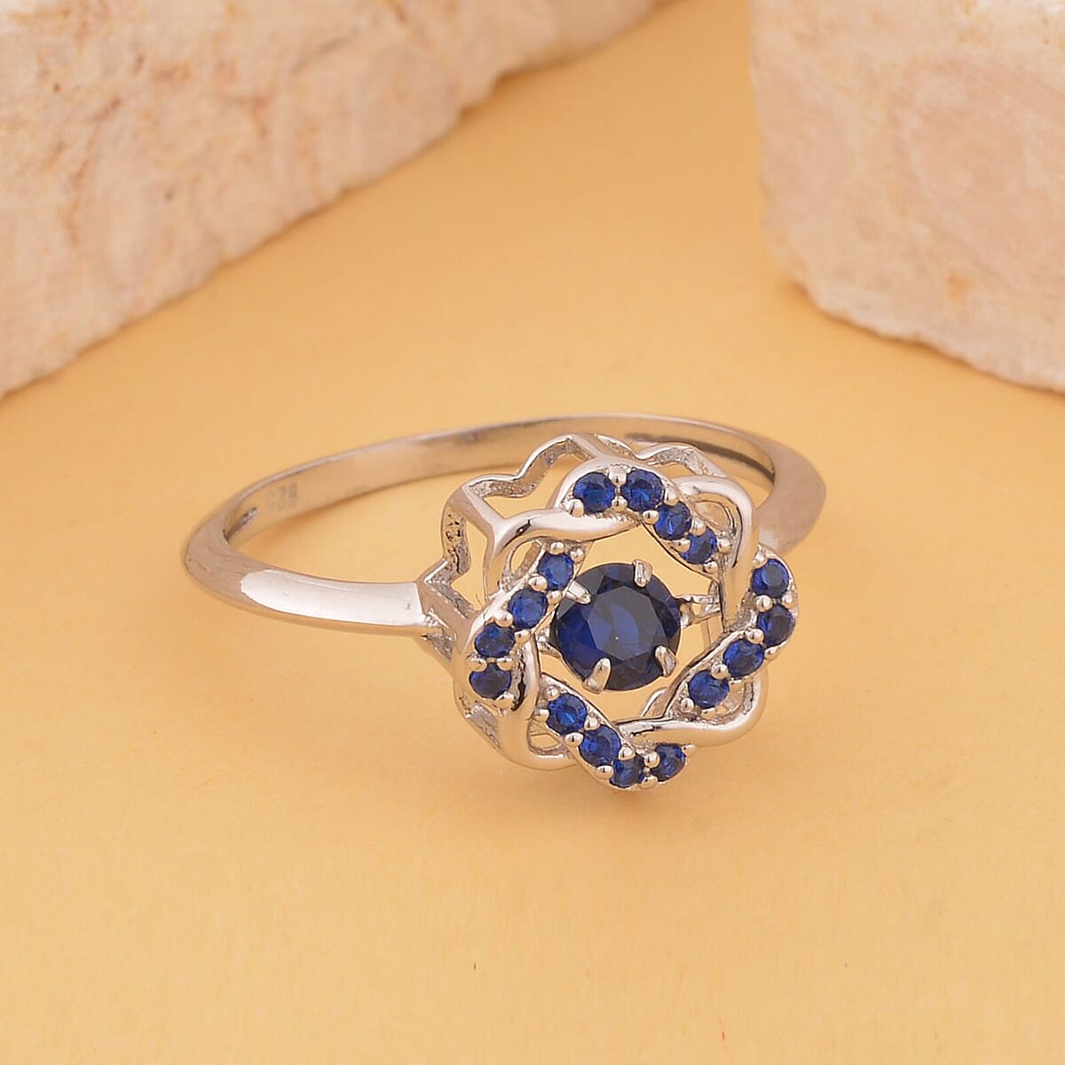 Sparkling Dancing Simulated Blue Diamond Ring in Rhodium Over Sterling Silver (Size 10.0) 0.65 ctw image number 1