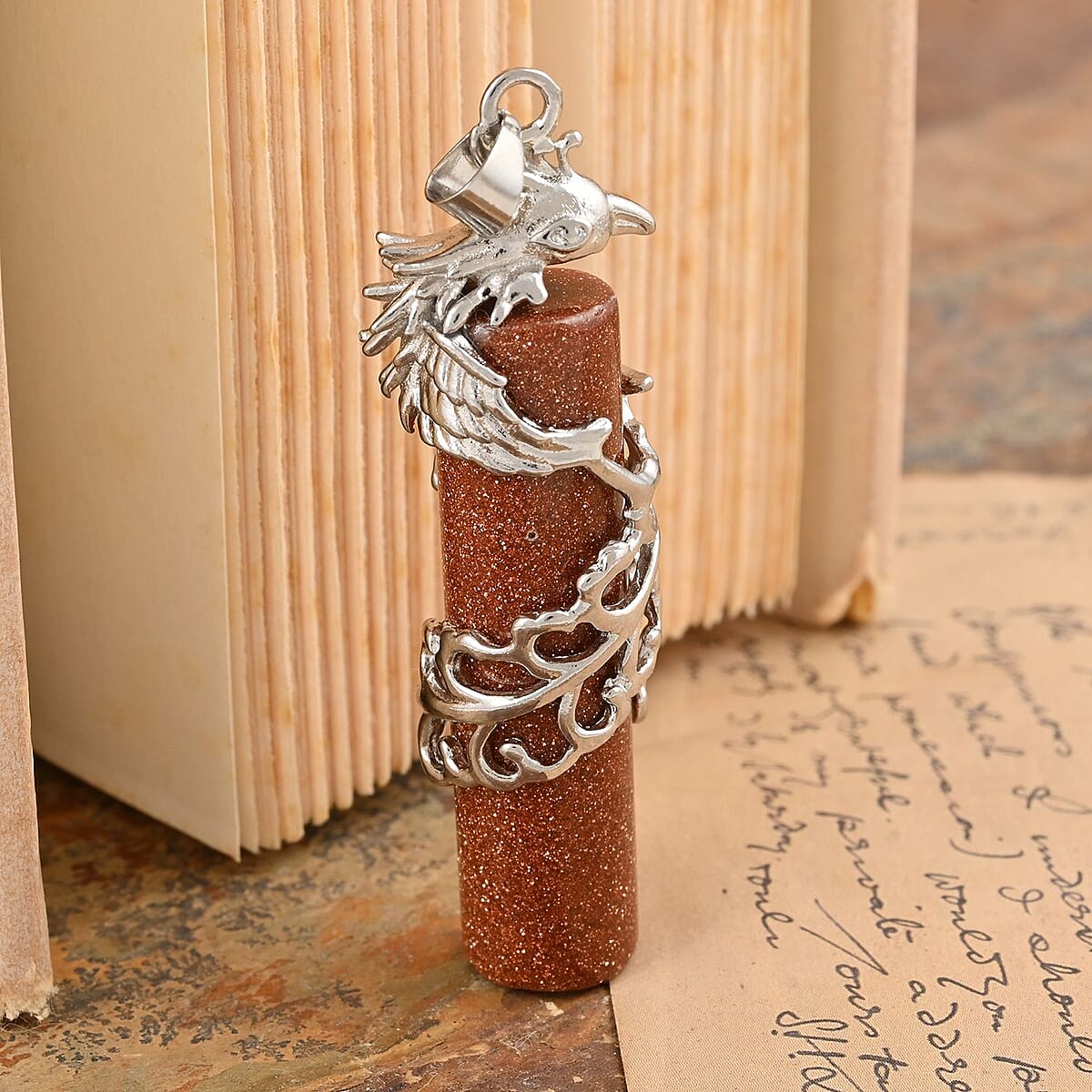 Gold Sandstone Cylinder Pheonix Pendant in Silvertone 50.50 ctw image number 1