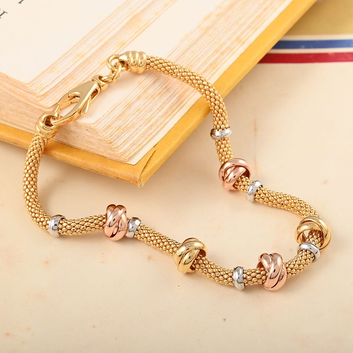 Italian 14K Tri-Color Gold 14mm Knot Bracelet (7.4 g) (7.50 In) image number 1