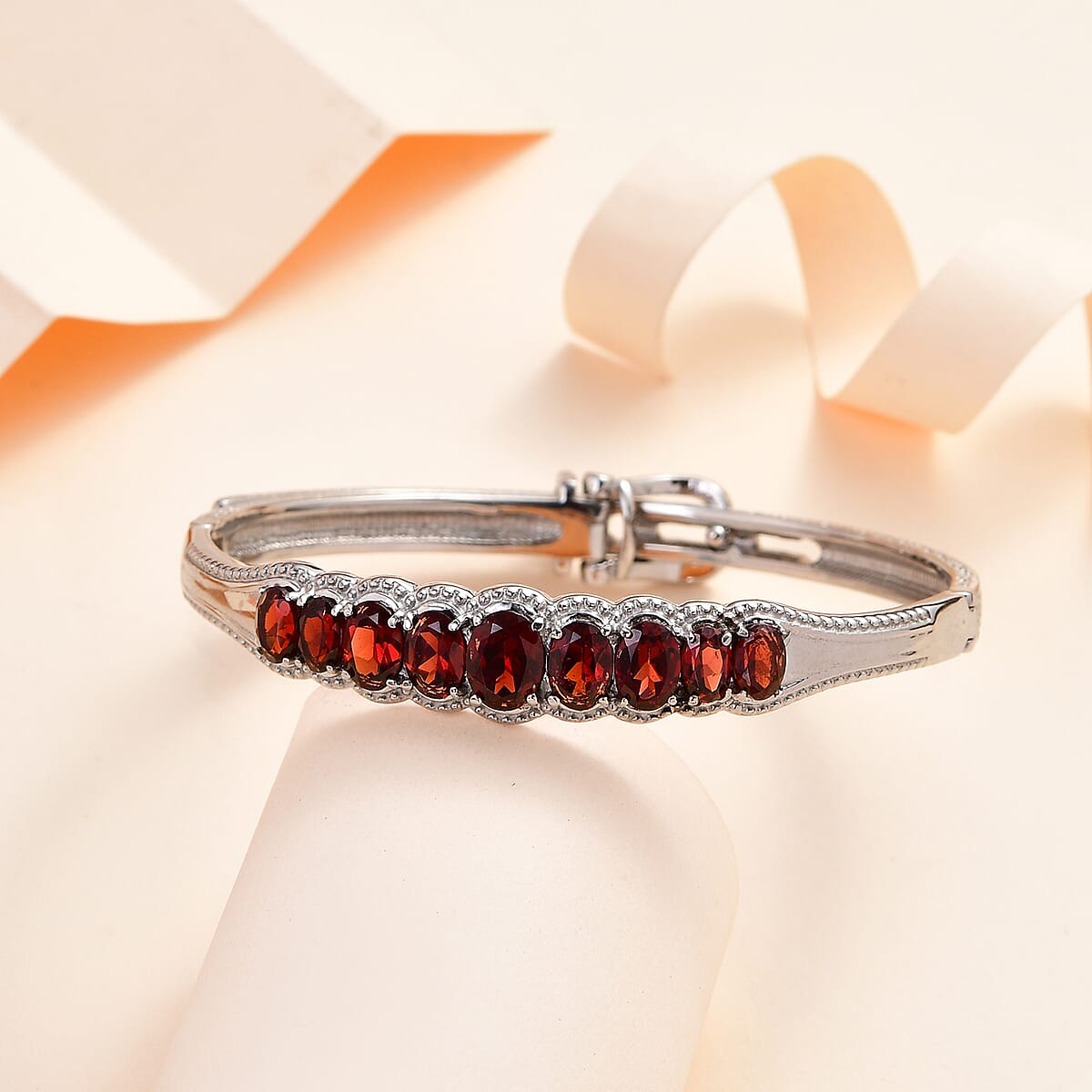 Mozambique Garnet 6.50 ctw Bangle Bracelet With Adjustable Lock in Stainless Steel (7.25 In) image number 1