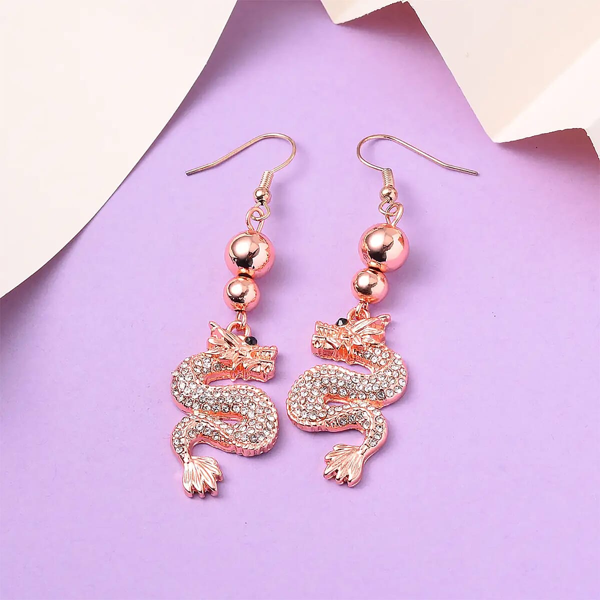White and Black Austrian Crystal Dragon Earrings in Rosetone image number 1