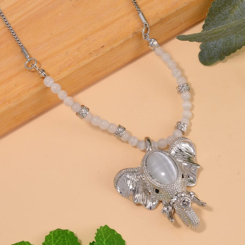 Lab Created White Cat's Eye and Austrian Crystal Elephant Pendant with Necklace in Silvertone 28-30 Inches