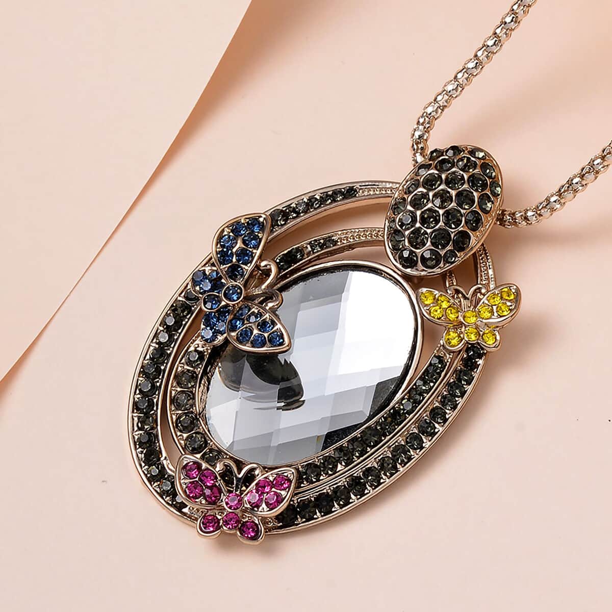 Silver Grey Color Glass, Multi Color Austrian Crystal Butterfly Pendant Necklace in Goldtone 28-30 Inches image number 1