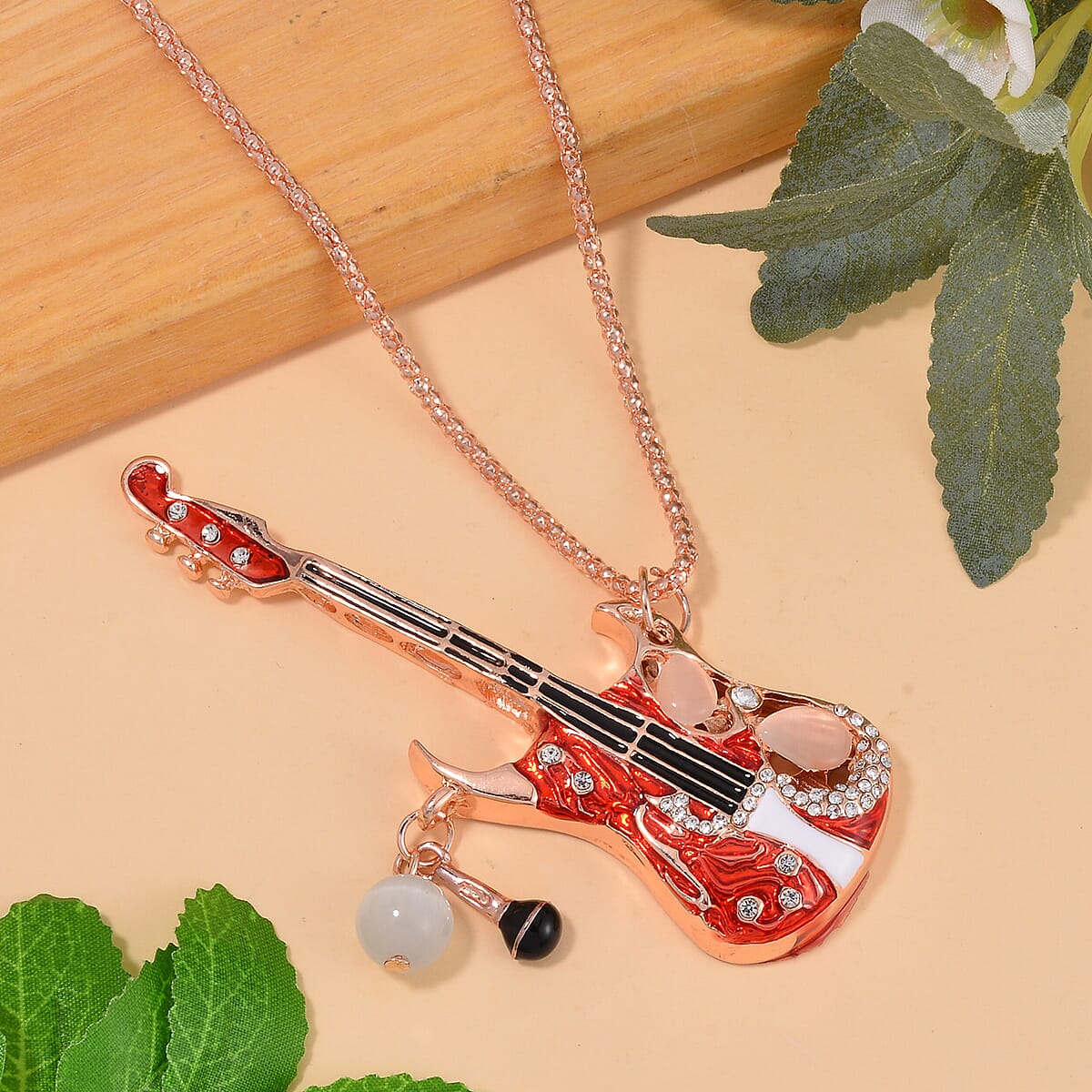 Lab Created White Cat's Eye and Austrian Crystal Guitar Pendant Necklace in Rosetone 28-30 Inches image number 1