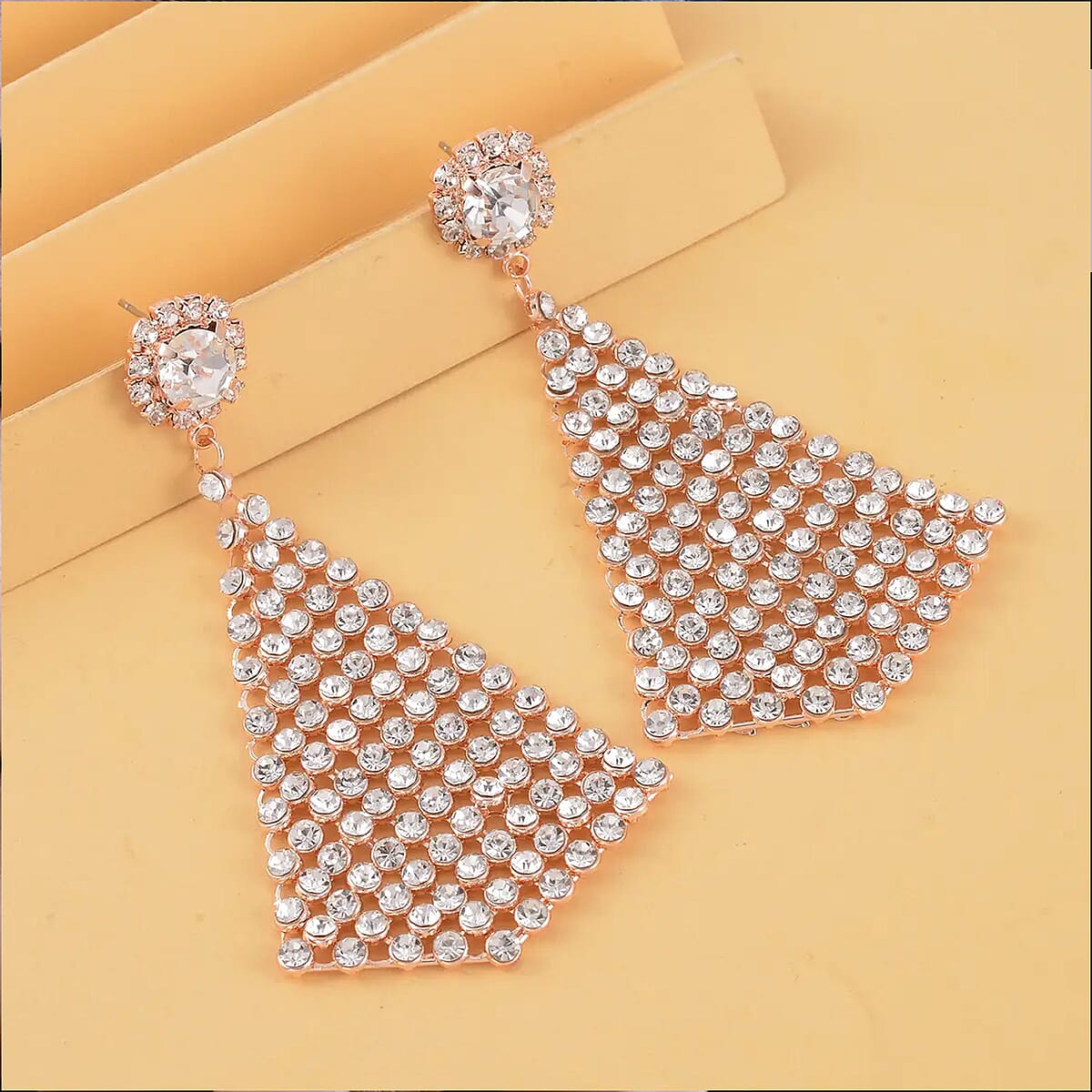 White Austrian Crystal Earrings in Rosetone image number 1