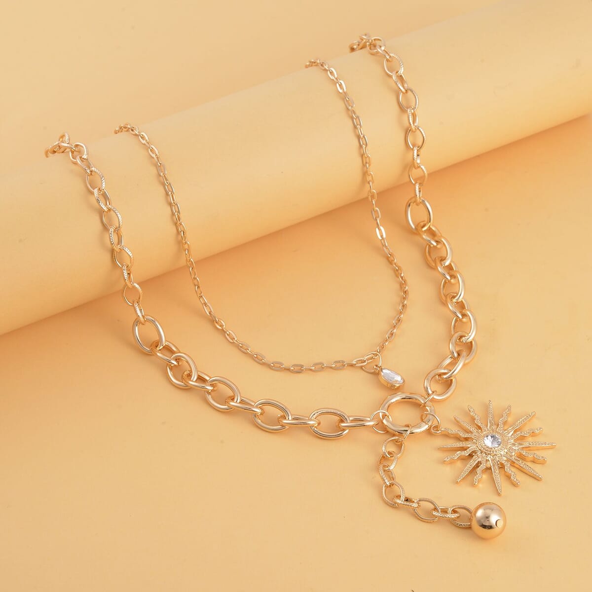Austrian Crystal Cable Chain Necklace with Sunburst Charm in Goldtone 20-22 Inches image number 1