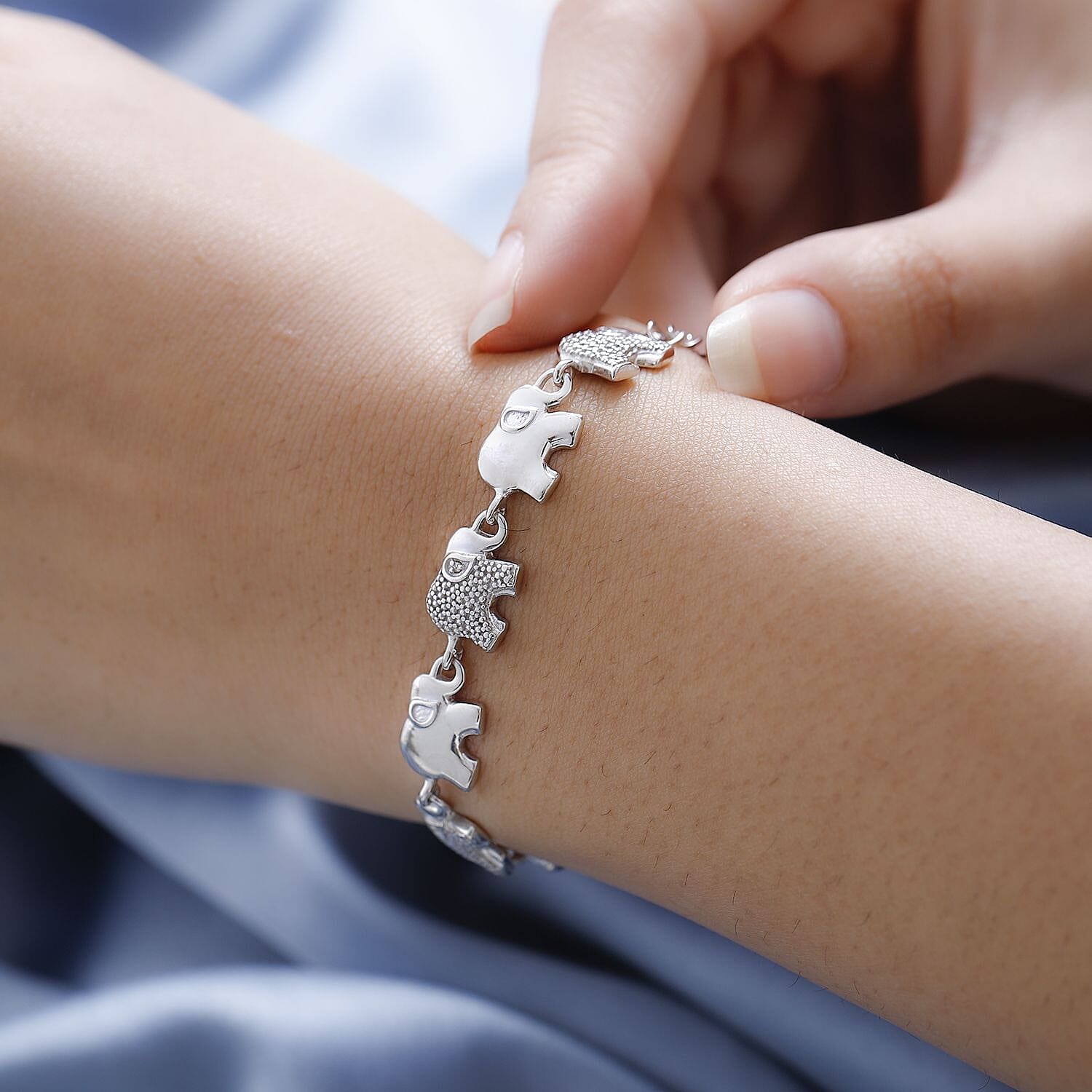 Karis Diamond Accent Elephant Bracelet in Platinum Bond (6.50 In)