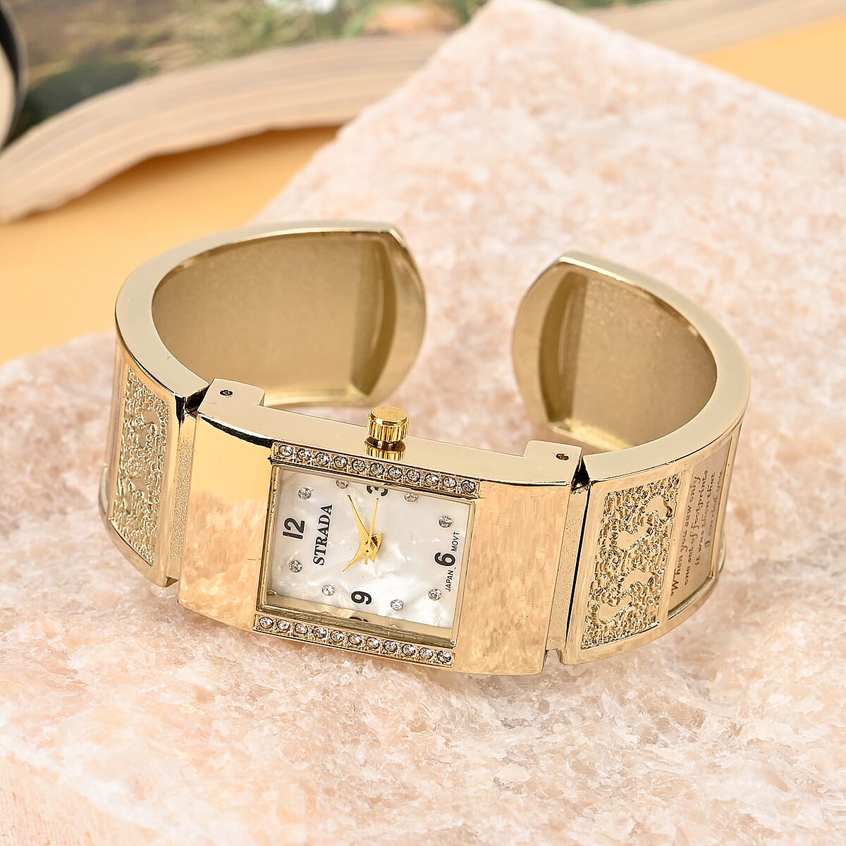 Strada Austrian Crystal Japanese Movement Footprint Pattern Bangle Watch in Goldtone (6.50 In) image number 1