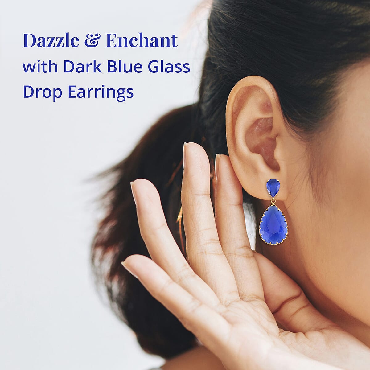 Dark Blue Glass Drop Earrings in Goldtone image number 2