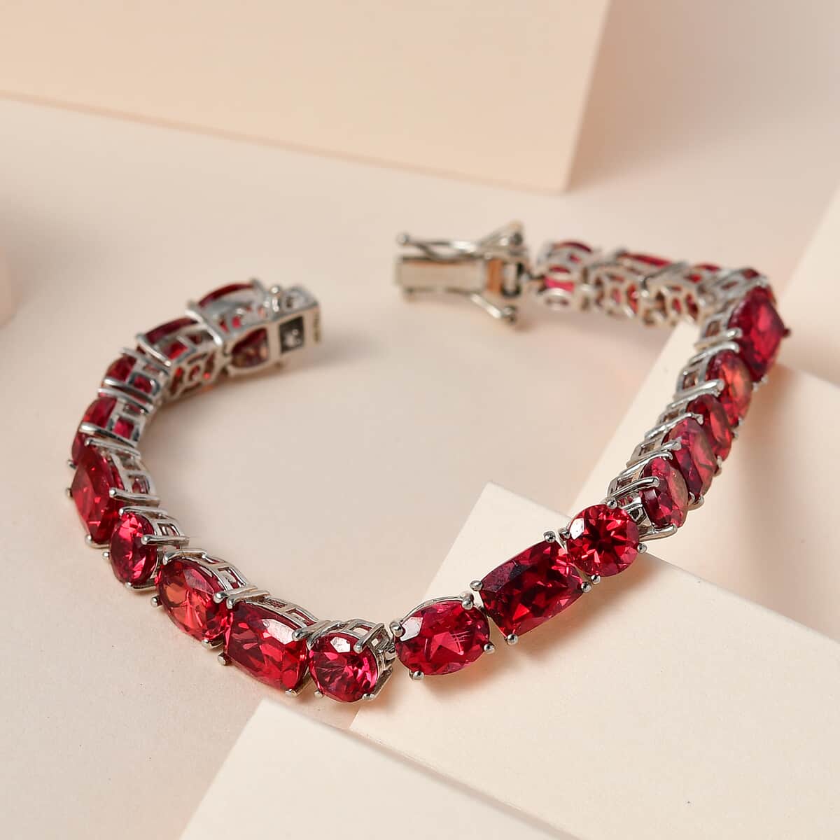 One Time Only Lab Created Padparadscha Sapphire Tennis Bracelet in Platinum Over Sterling Silver (8.00 In) 47.15 ctw image number 1