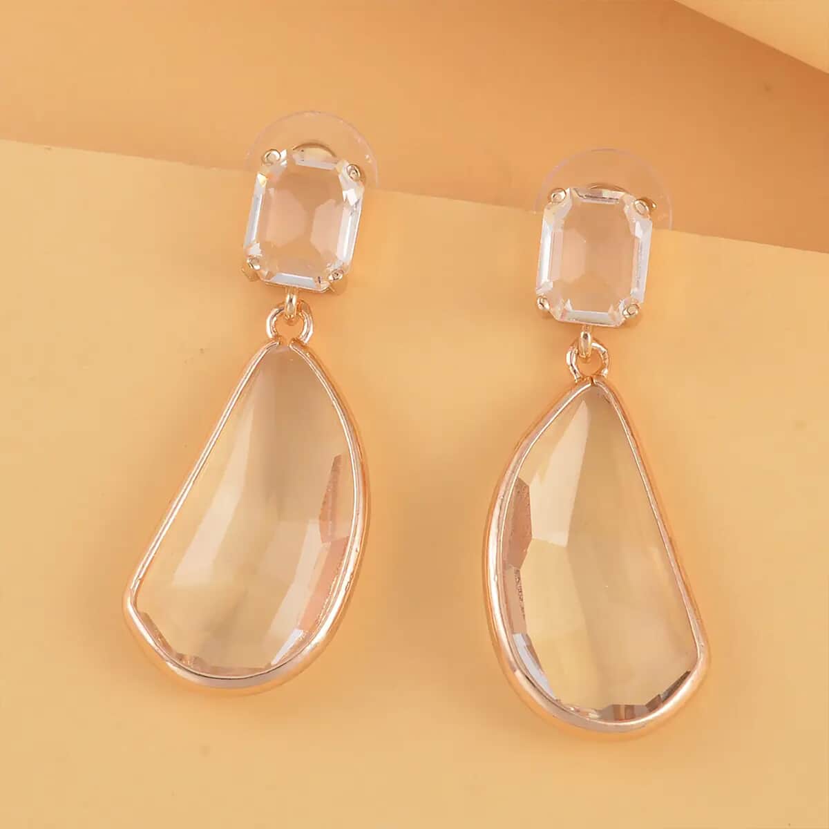 White Glass Pear Shape Drop Earrings in Goldtone image number 1