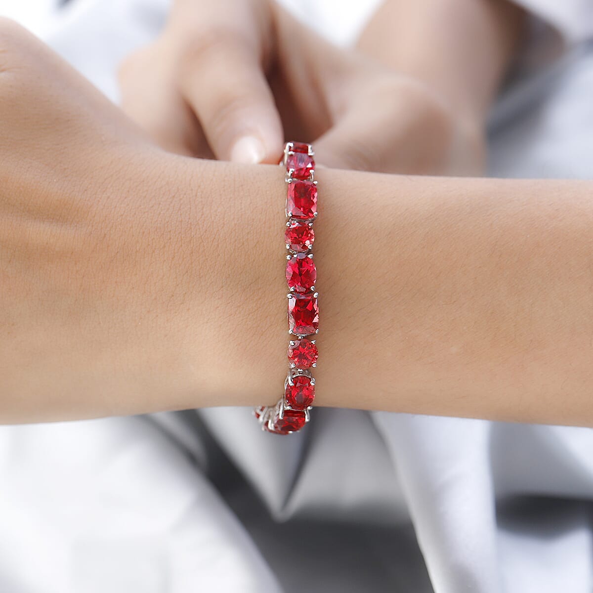 Lab Created Padparadscha Sapphire Tennis Bracelet in Platinum Over Sterling Silver (7.25 In) 42.70 ctw image number 2