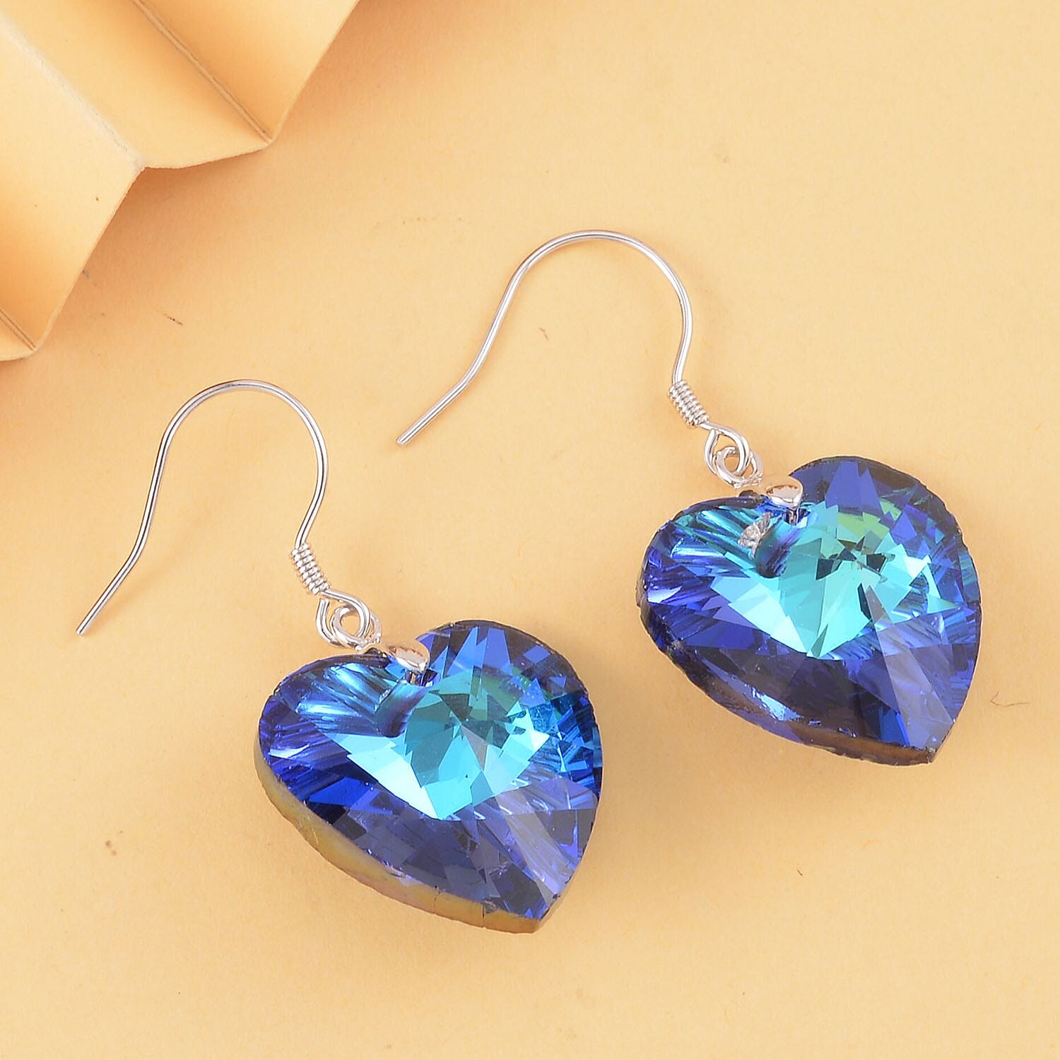 Simulated Blue Magic Color Quartz Heart Dangle Earrings in Rhodium Over Sterling Silver