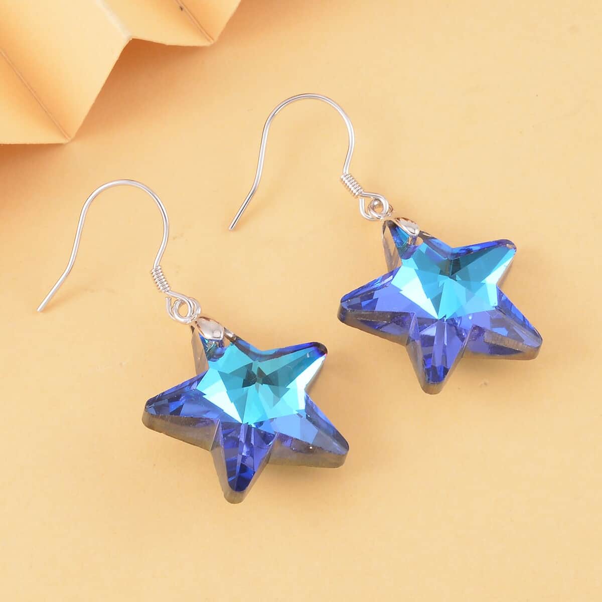 Simulated Blue Sapphire Star Earrings in Rhodium Over Sterling Silver image number 1