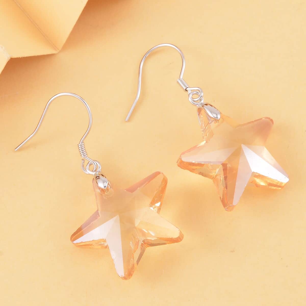 Simulated Champagne Quartz Star Earrings in Rhodium Over Sterling Silver image number 1