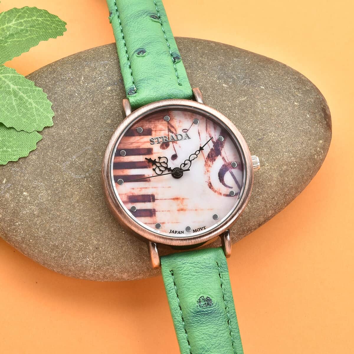 Strada Japanese Movement Piano Pattern Dial Watch in Green Ostrich Embossed Faux Leather Strap image number 1
