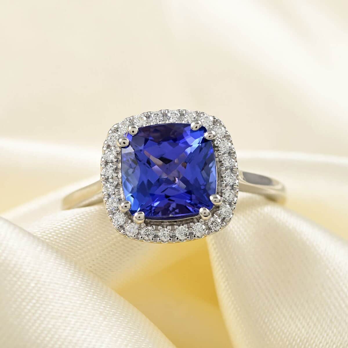 Certified Rhapsody 950 Platinum AAAA Tanzanite and E-F VS Diamond Halo Ring (Size 9.5) 5.65 Grams 3.25 ctw image number 1