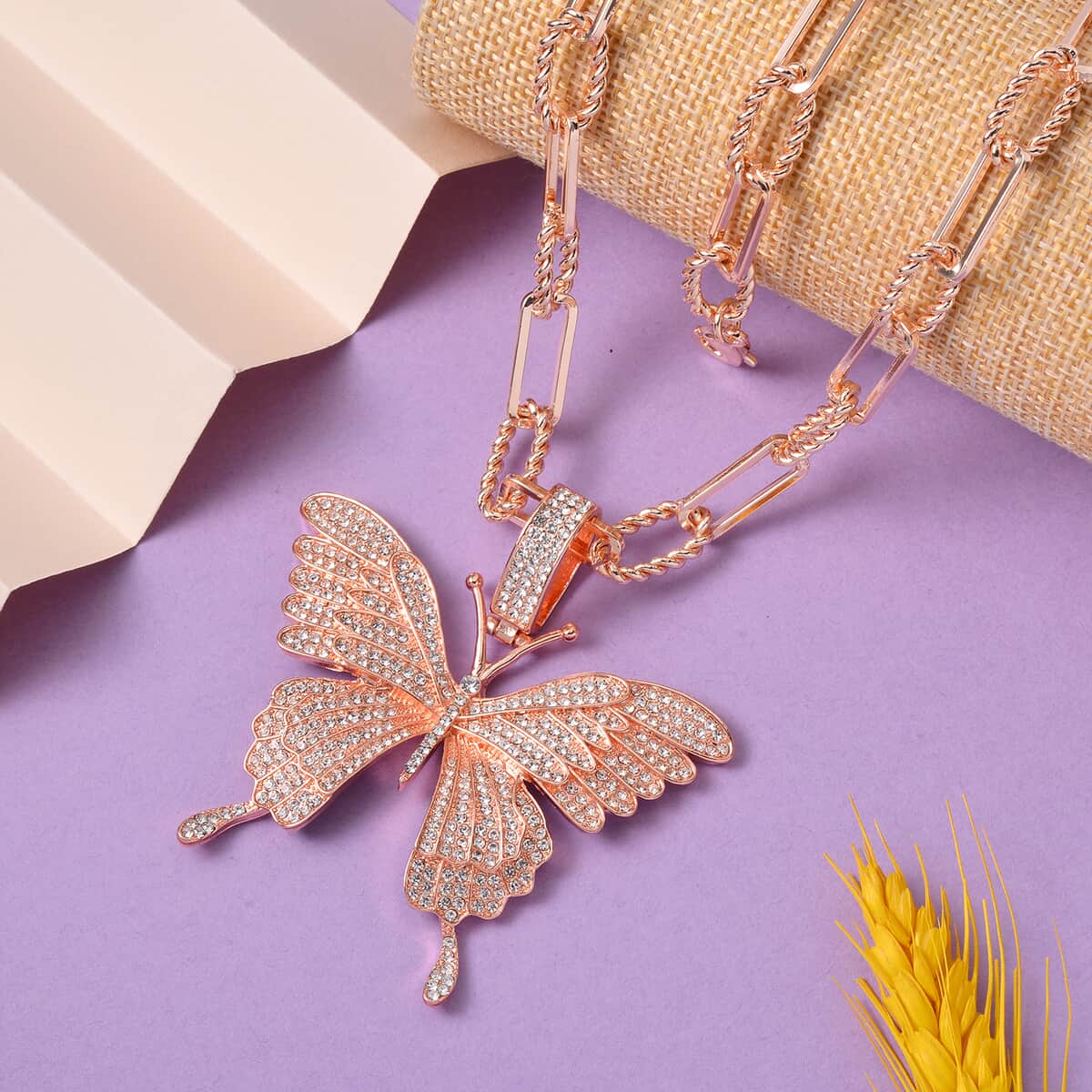 Austrian Crystal Butterfly Pendant Necklace 20-22 Inches in Rosetone image number 1