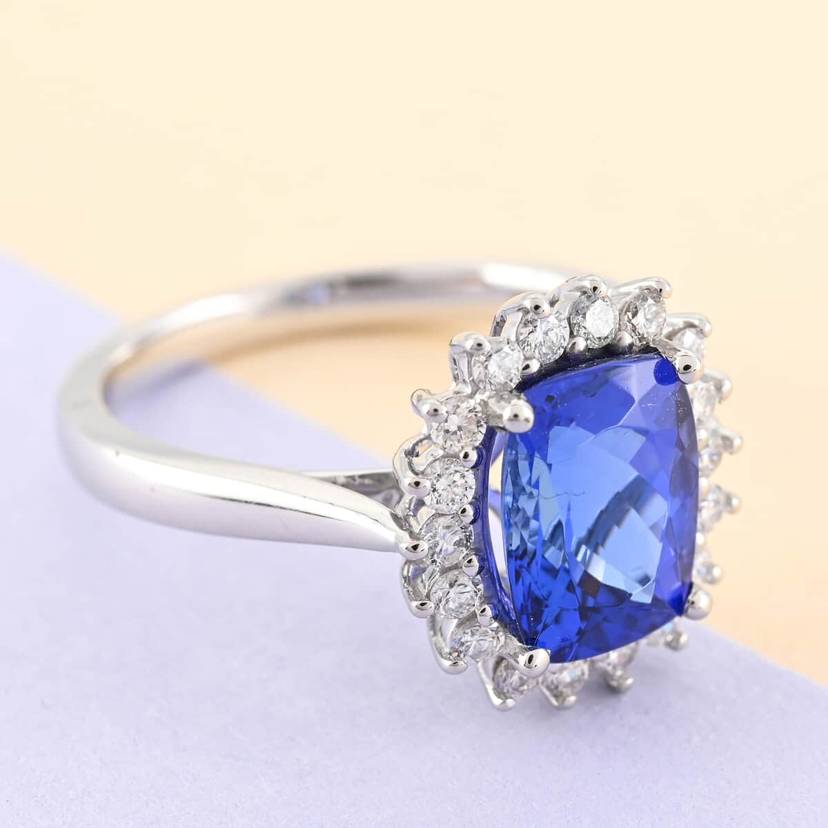 Rhapsody 950 Platinum AAAA Tanzanite and E-F VS Diamond Halo Ring 5.60 Grams 2.60 ctw image number 1