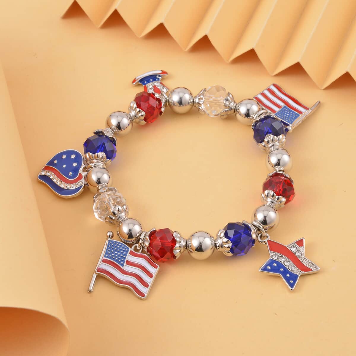 Multi Color Glass and Austrian Crystal American Flag Pattern Charm Bracelet in Silvertone (7-7.5In) image number 1