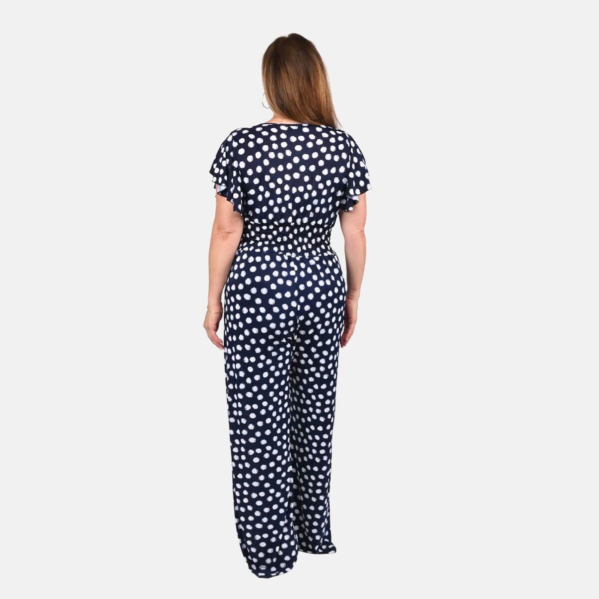 Tamsy Navy Polka Dot Pattern Smocked Waist Jumpsuit with Flutter Sleeve - One Size Fits Most image number 1