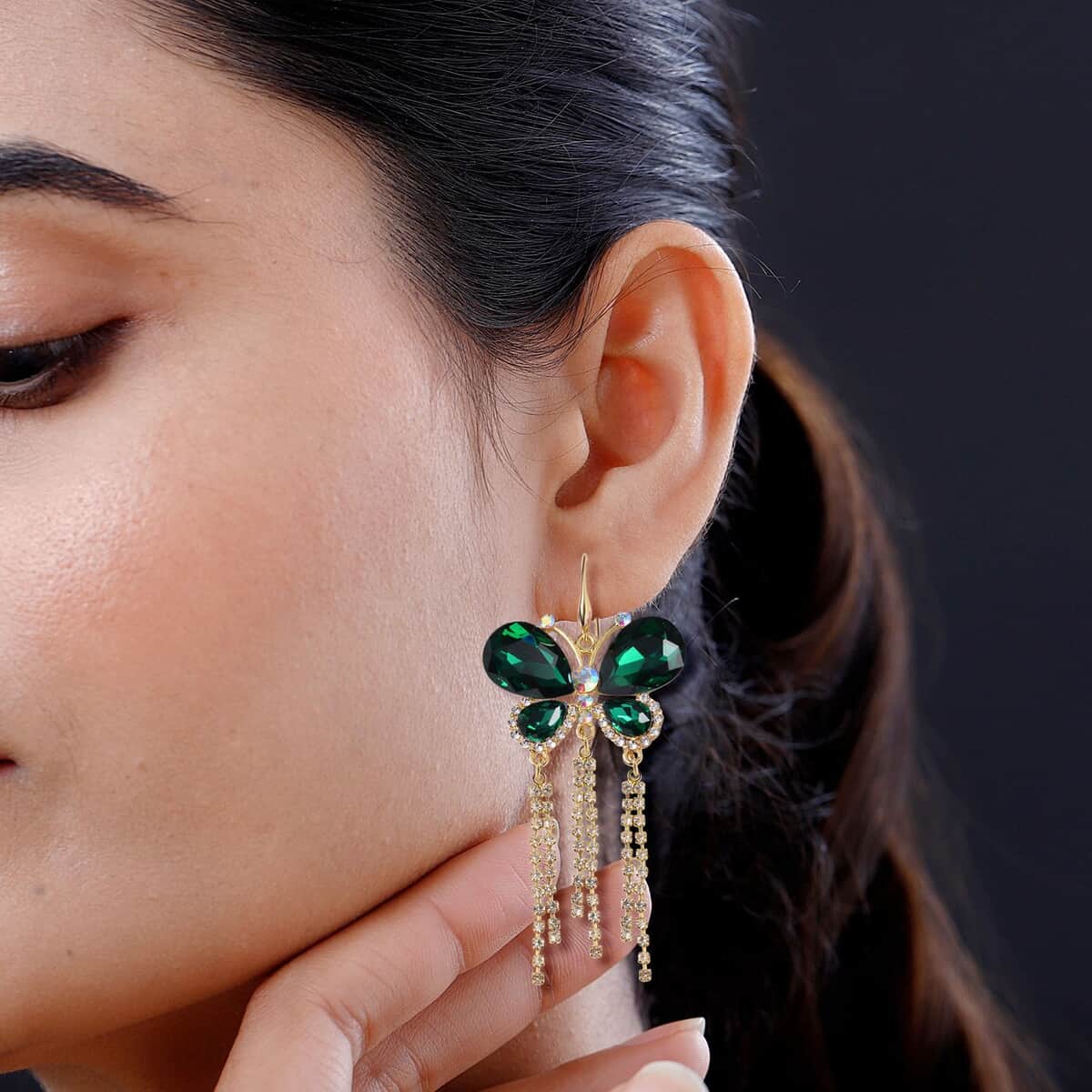 Green Glass, Austrian Crystal Butterfly Earrings in ION Plated YG Stainless Steel & Goldtone image number 2