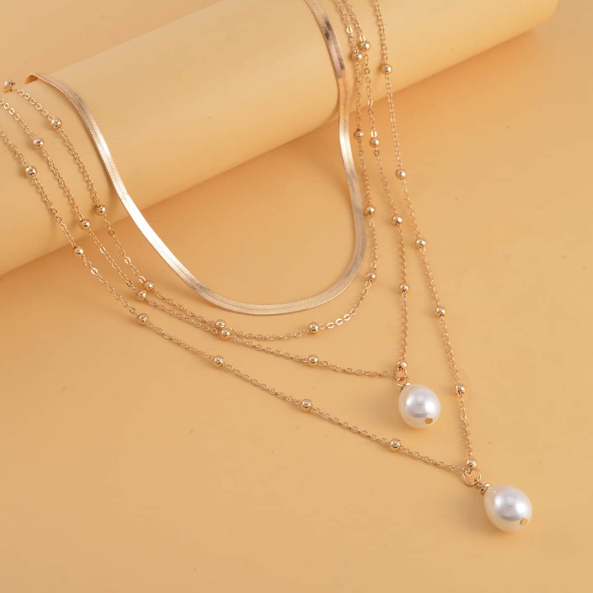 Simulated Pearl Station Necklace 15.5-19.5 Inches in Goldtone image number 1