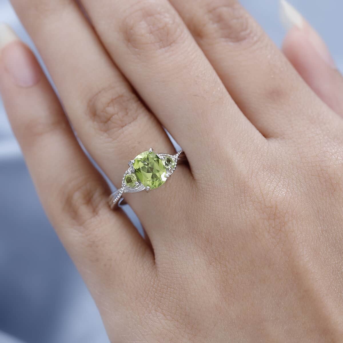 Peridot 3 Stone Ring in Platinum Over Sterling Silver (Size 6.0) 1.65 ctw image number 2