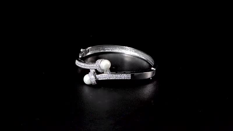 Simulated Pearl and Simulated Diamond Bypass Bangle Bracelet in Silvertone (7.0 In) 1.00 ctw