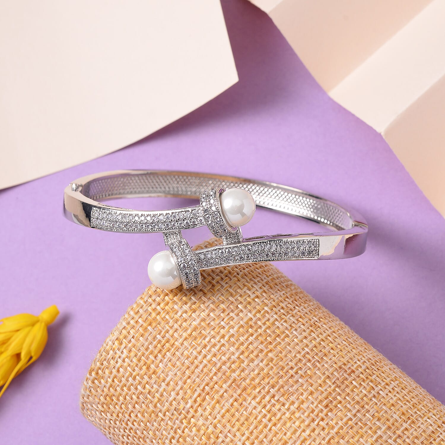 Simulated Pearl and Simulated Diamond Bypass Bangle Bracelet in Silvertone (7.0 In) 1.00 ctw