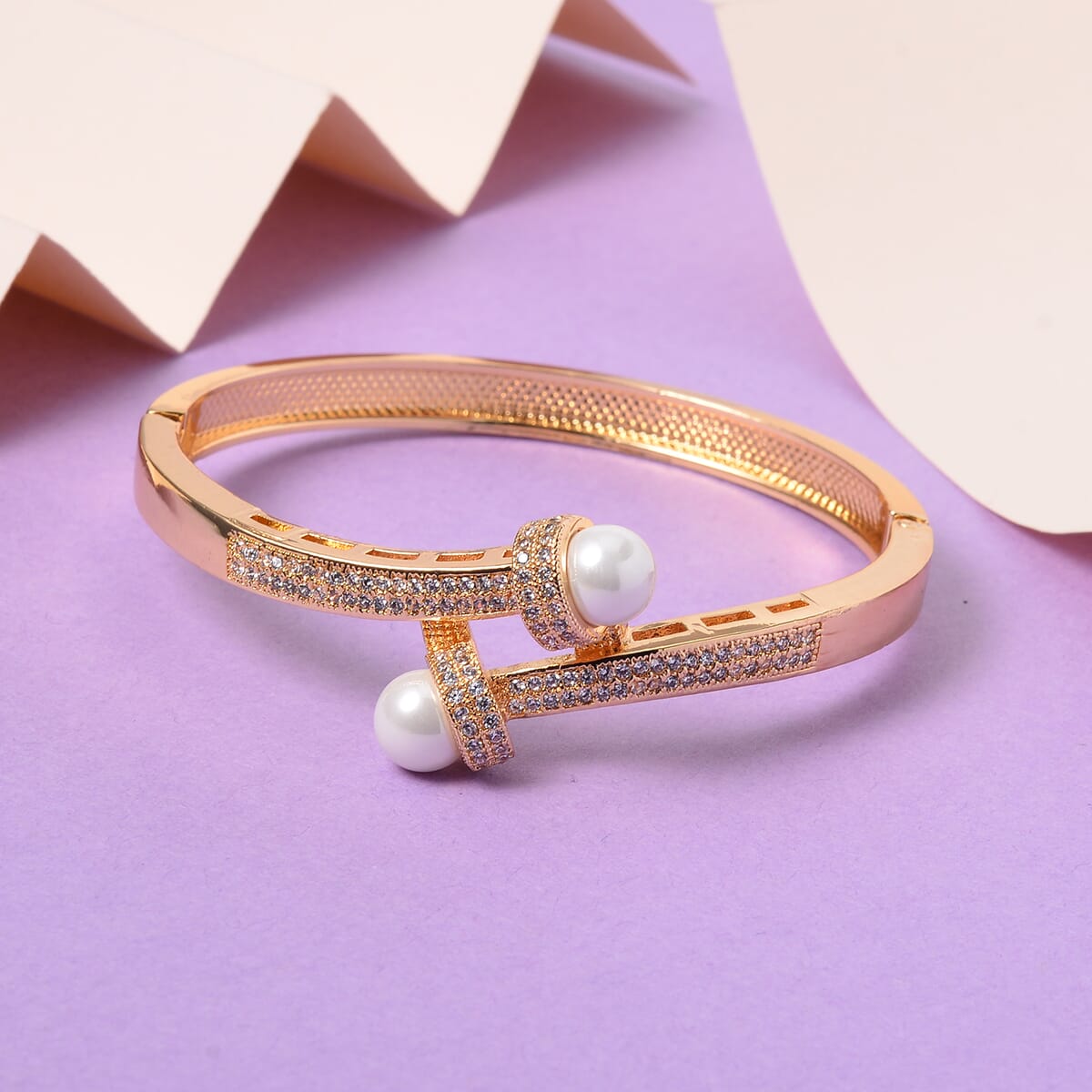 Simulated Pearl and Simulated Diamond Bypass Bangle Bracelet in Goldtone (7.0 In) 1.00 ctw image number 1